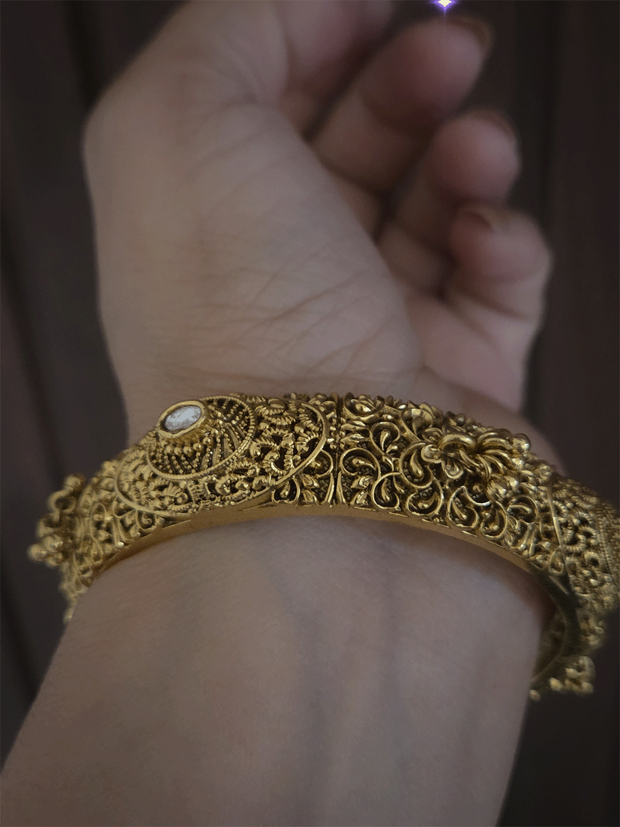 Set of two self paisley design kundan and ghunghru hangings openable kada's