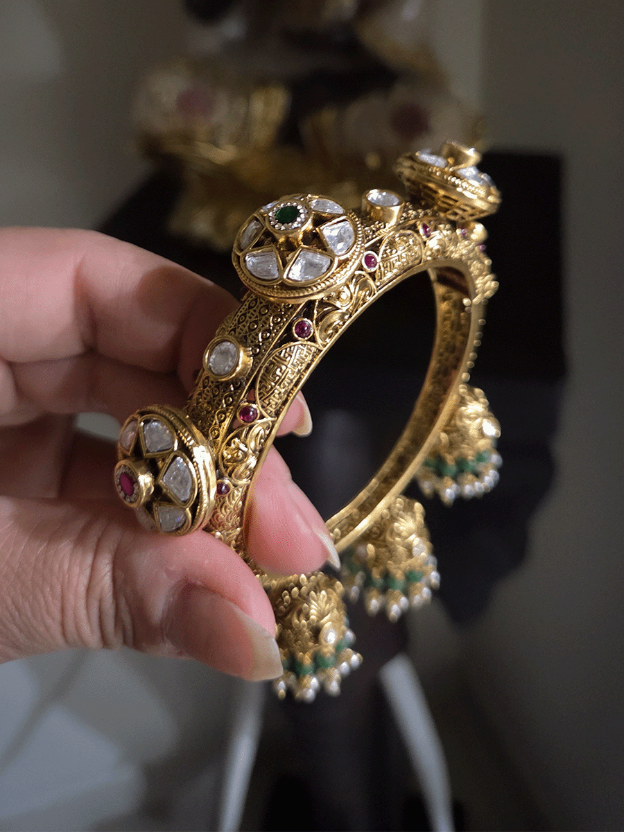 Three kundan flower pacheli style intricate design three hanging jhoomkies with aqua beads single openable kada