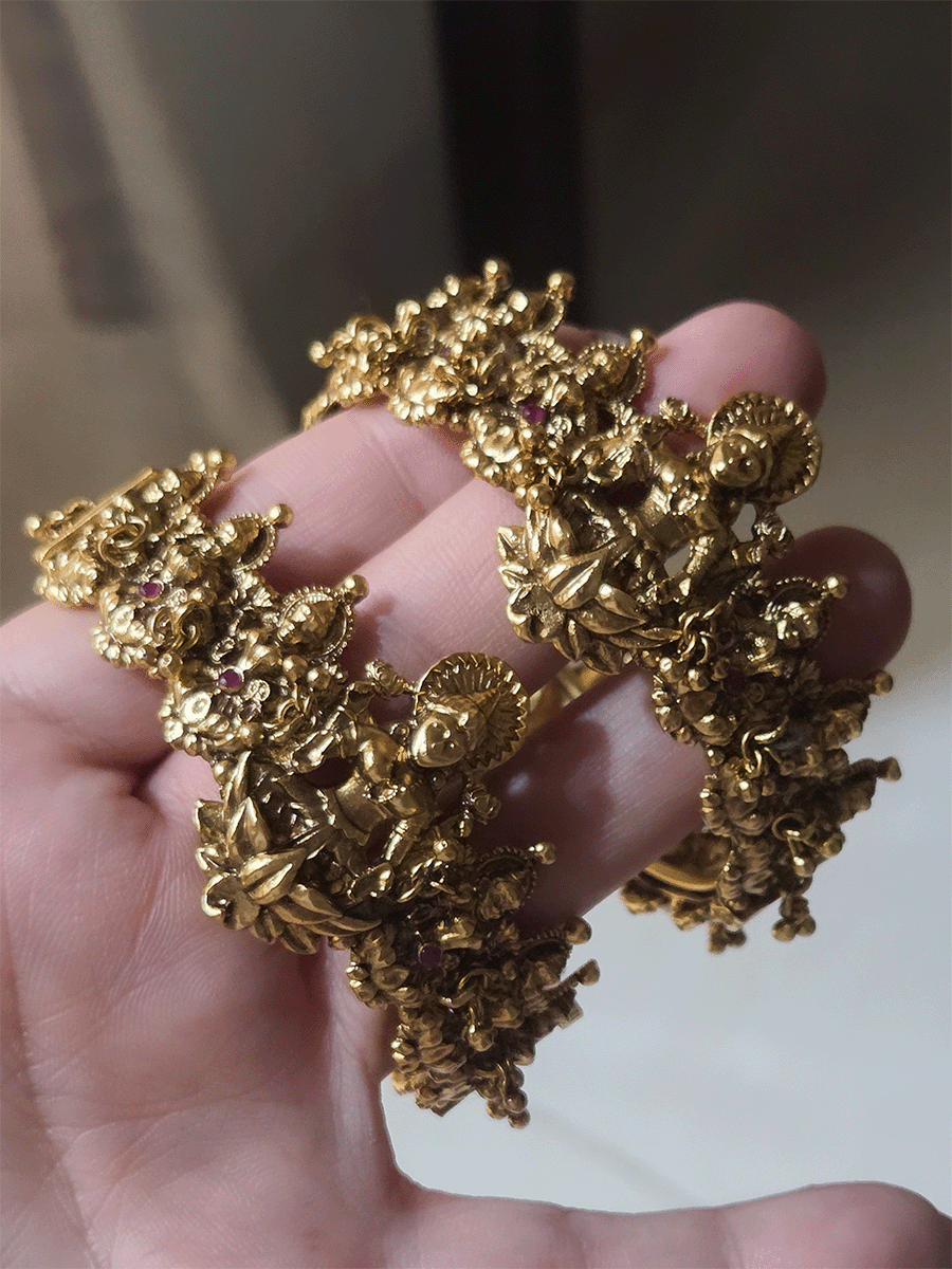 Set of two laxmiji openable kada's with ruby stones and ghunghru hangings