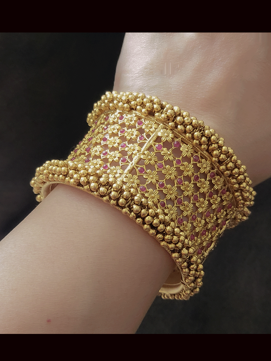 Set of two broad openable flower mesh with ruby stones kada's and gold bead cluster lace on both the sides