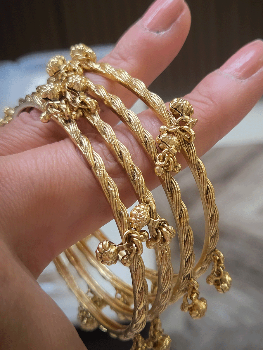 Set of four rope design bangles with ghunghru hangings