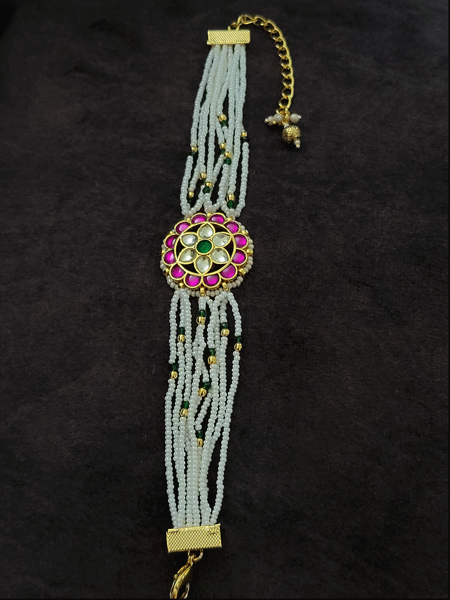 Flower design paachi kundan ruby, green and white cheed string bracelet