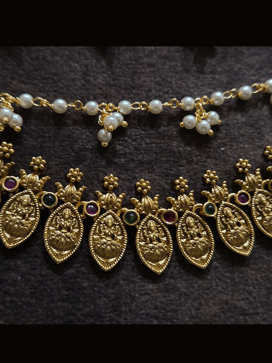 Laxmiji motif's in leaf string triple layer ear chains with two pearl bead strings