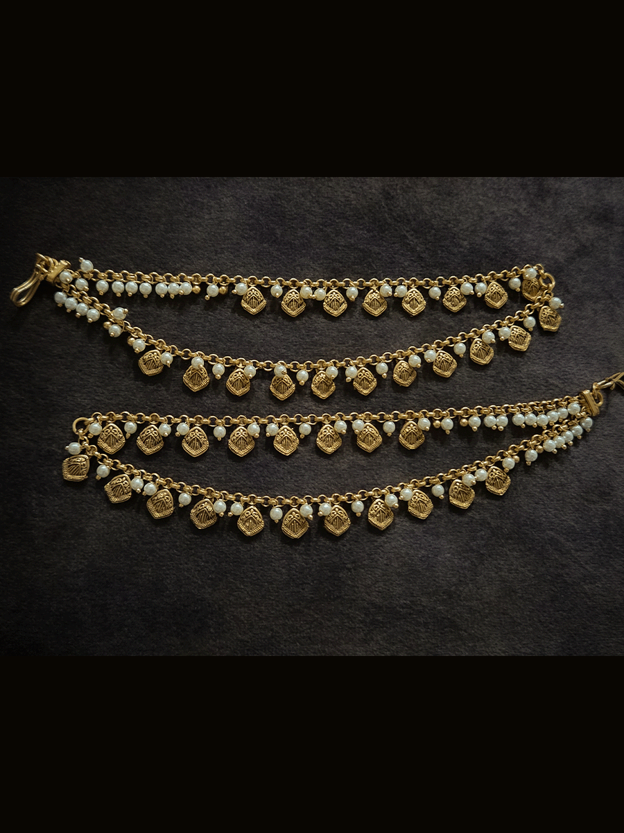 Two layer traditional self design tukdies with pearl hangings ear chains