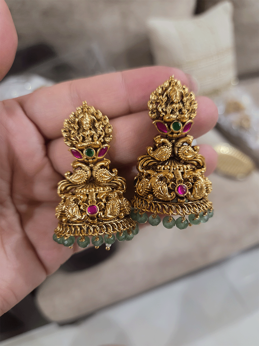 Laxmiji on flower top with peacock in center and peacock domb design jhoomki