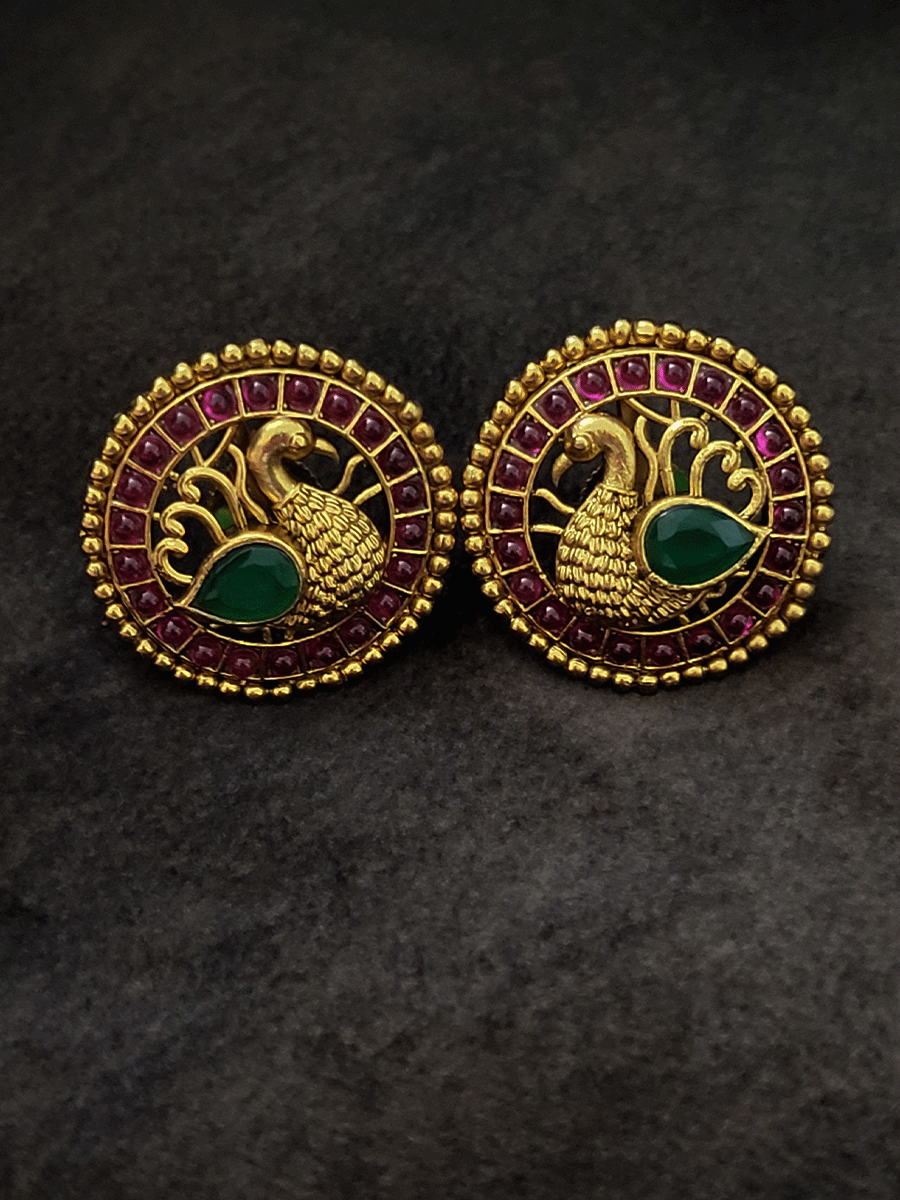 Peacock design round studs with ruby and green stones