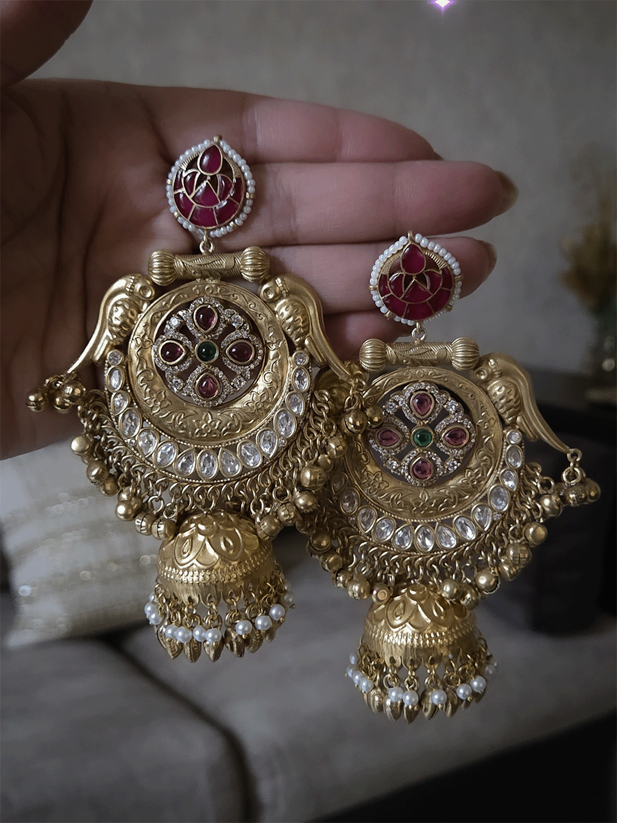 Stone studded leaf top 11cm long jhoomki earrings with peacock side design and polki's