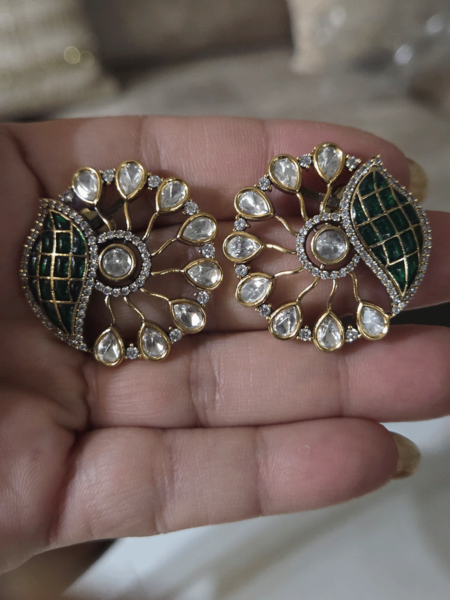Circular kundan studs with one side coloured leaf design(3.5cm)