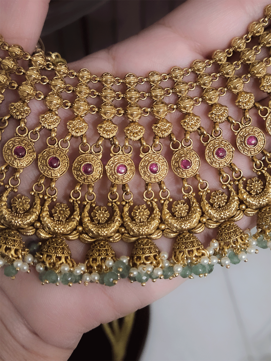 Broad choker set with circular tukdies and half jhoomki aqua bead design