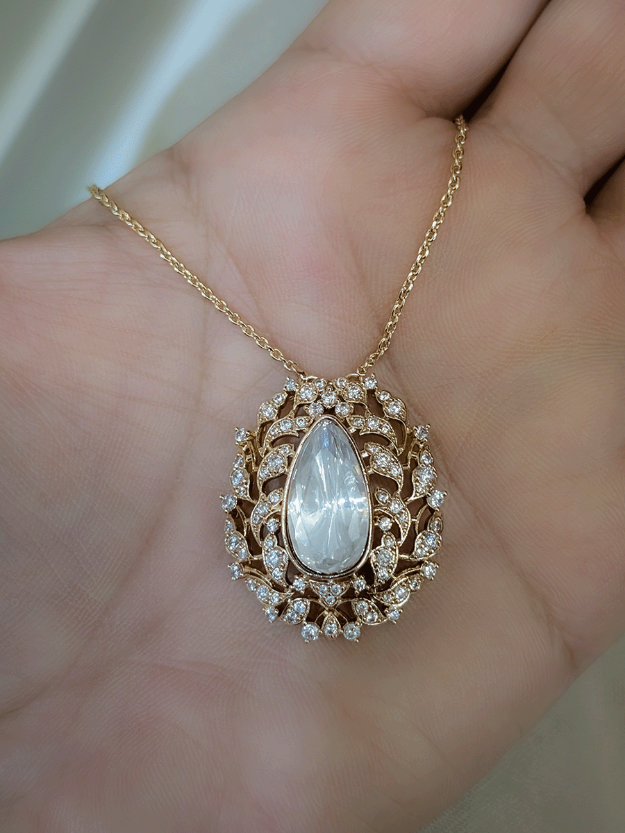 Intricate design AD embedded tear drop mossanite pendant set