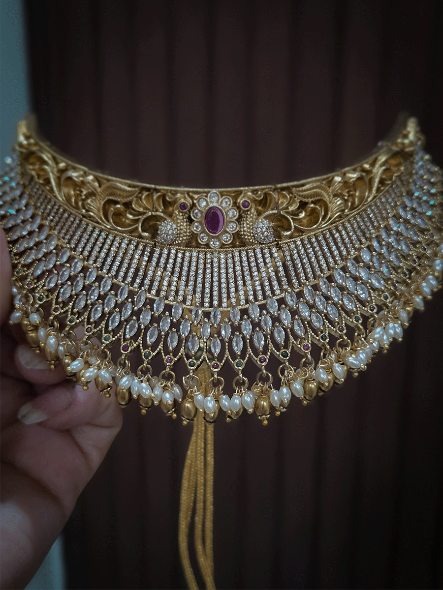 Marquise shaped stone and zircon studded broad choker set with intricate design on top