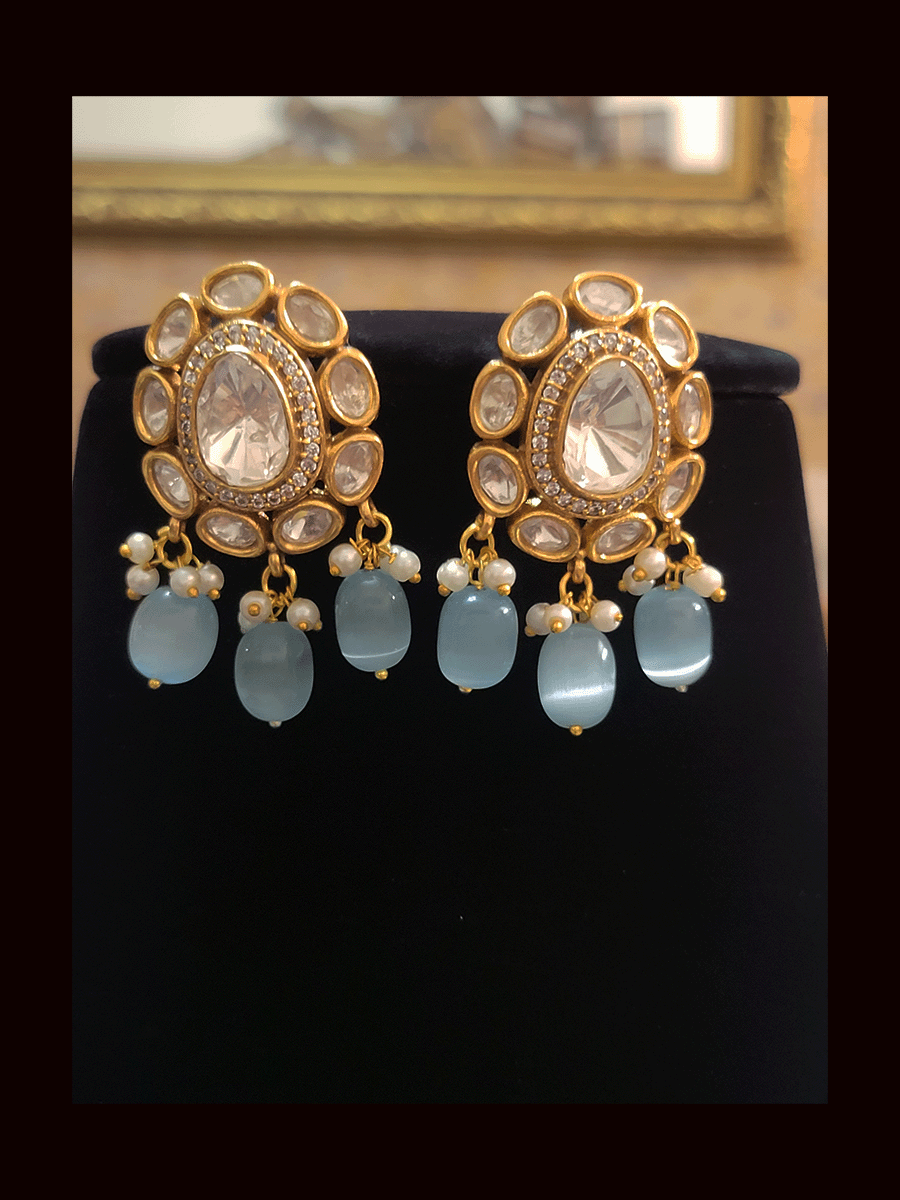 Multiple string oval kundan pendant set with bead drops