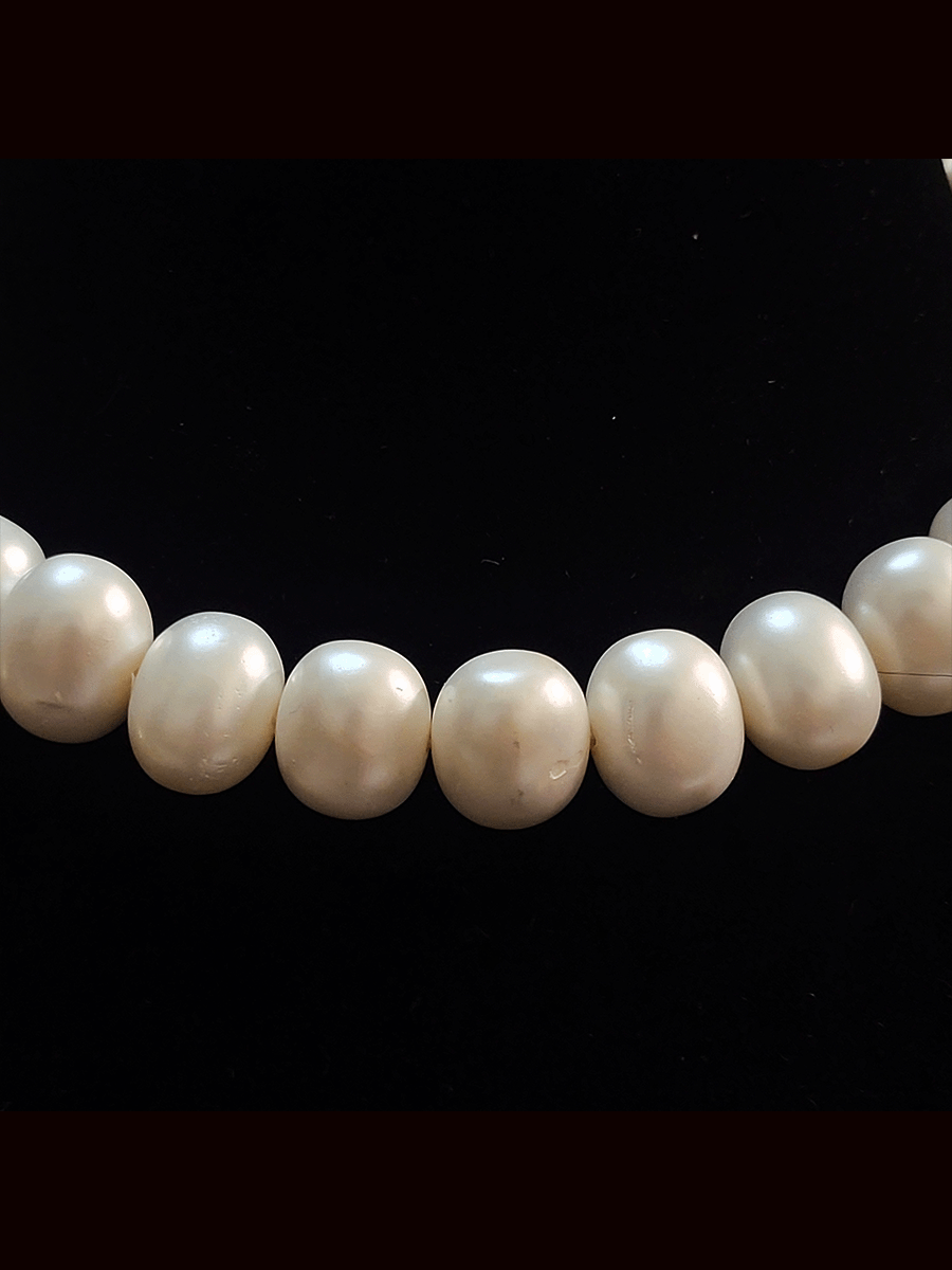 1.75 cm egg shell bead 8 inch long string