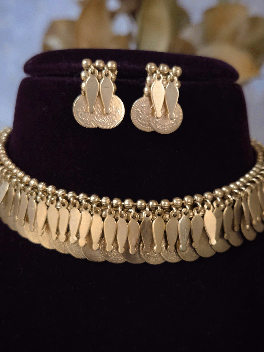Traditional coin design set with falling leaves top line