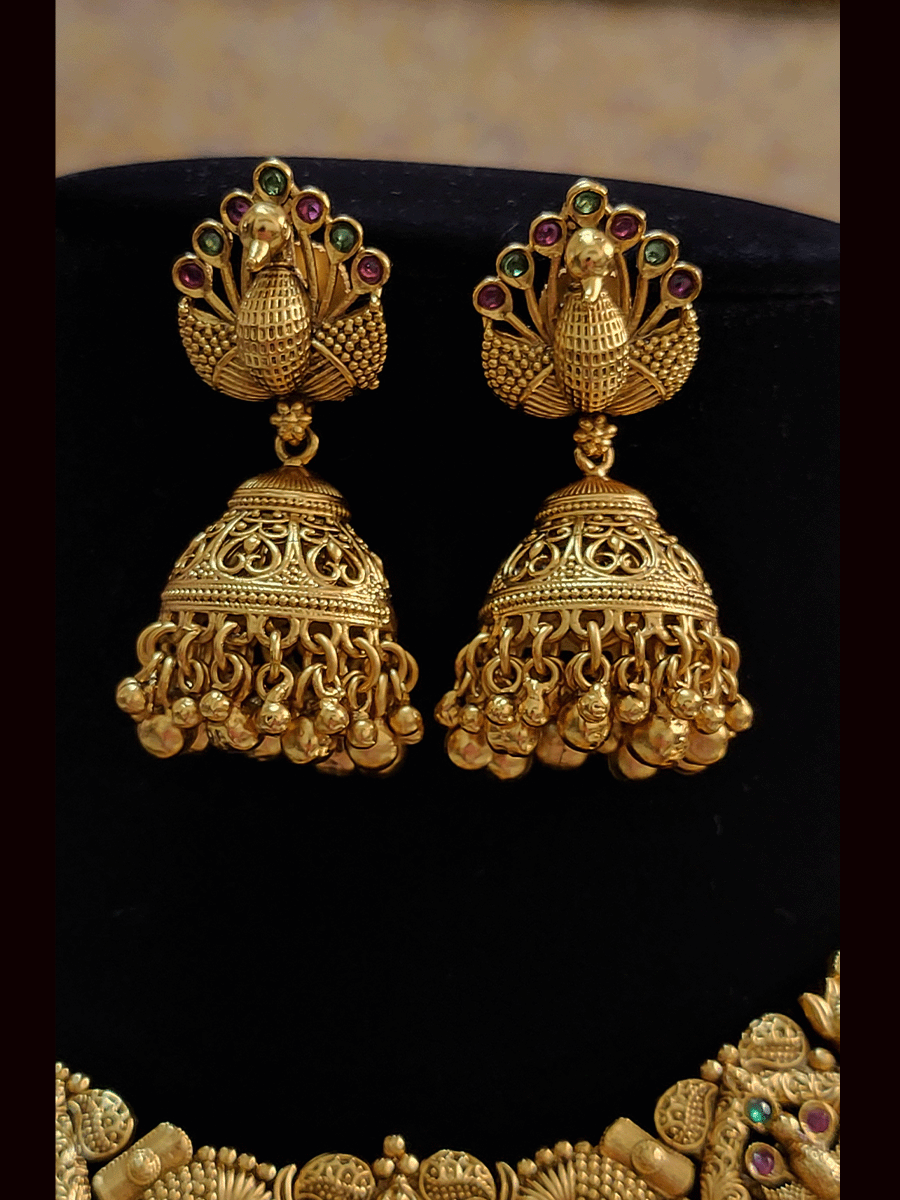 Peacock center with intricate carving and ghunghru hanging traditional necklace set