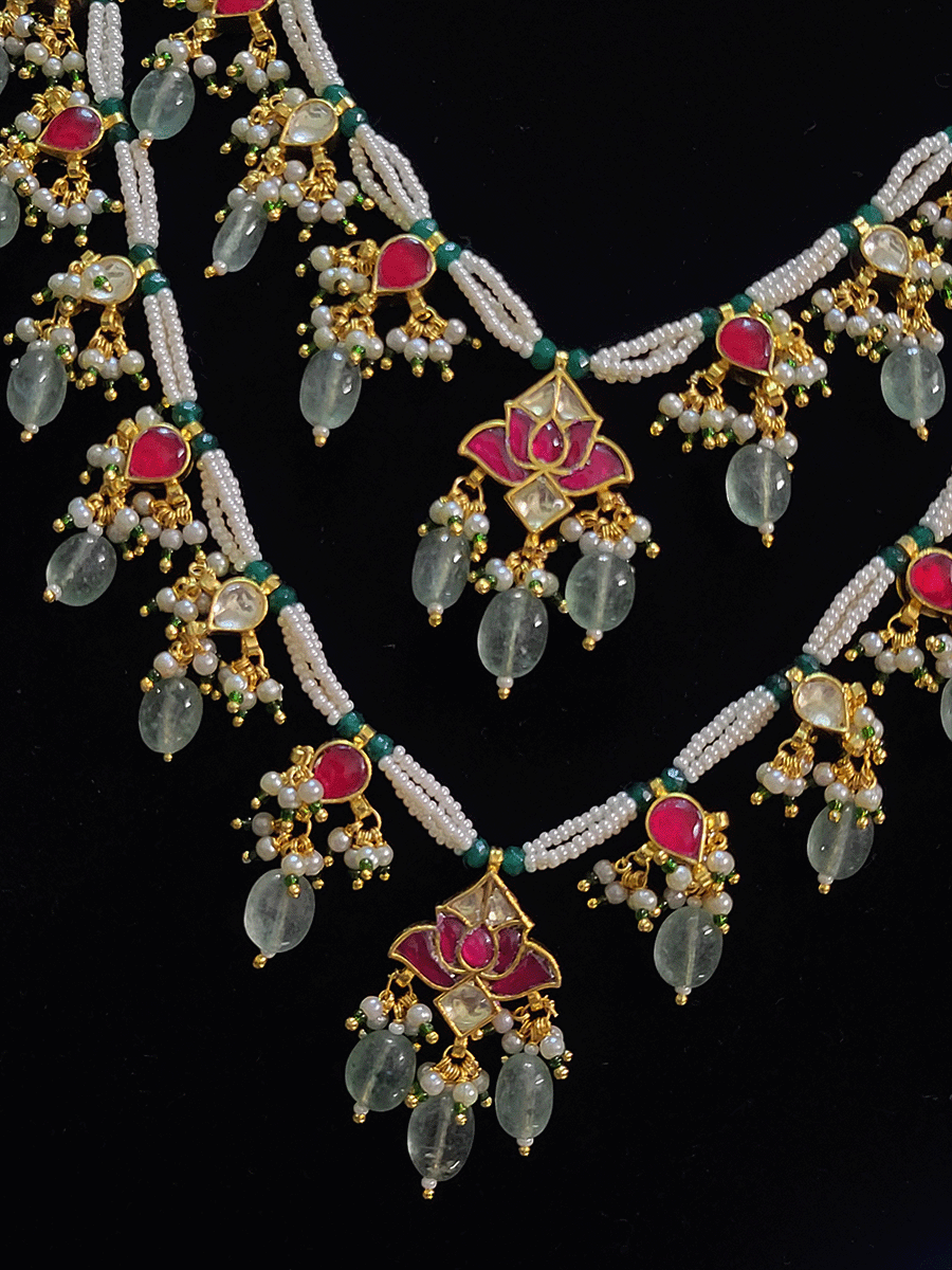 Paachi kundan double layer lotus tukdi in the center with aqua green drops set