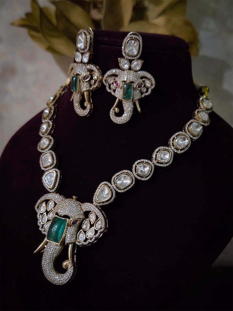 Ganpatiji face moissanite pendant set with bold green stone