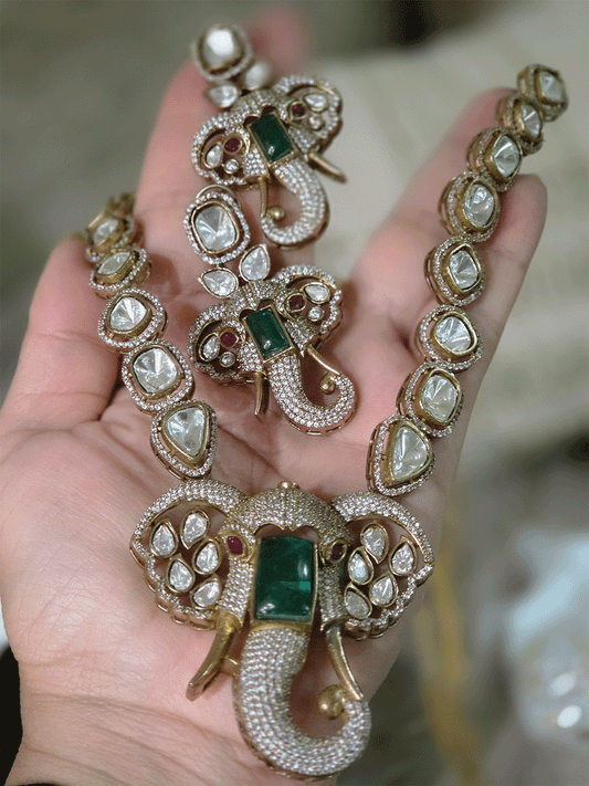 Ganpatiji face moissanite pendant set with bold green stone