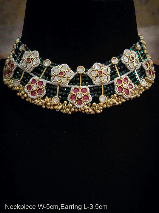 Green strings kundan and ruby pirohi work flowers broad necklace set with golden ghunghru detailing