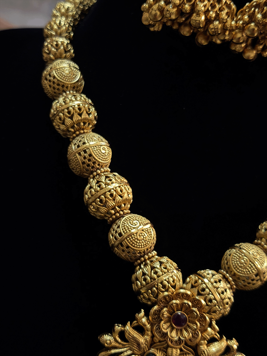 Bold circular pendant flower center and peacock top matar bead strings set