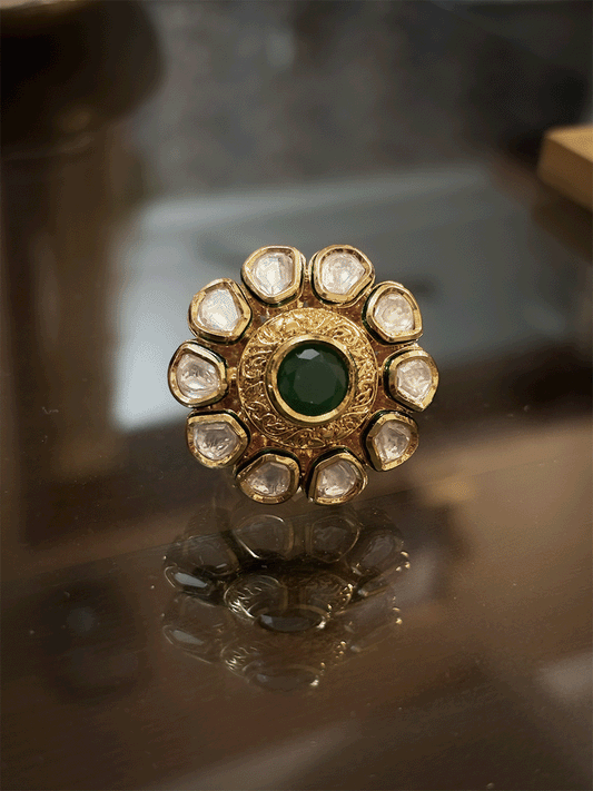 Flower design adjustable kundan ring with green stone in center