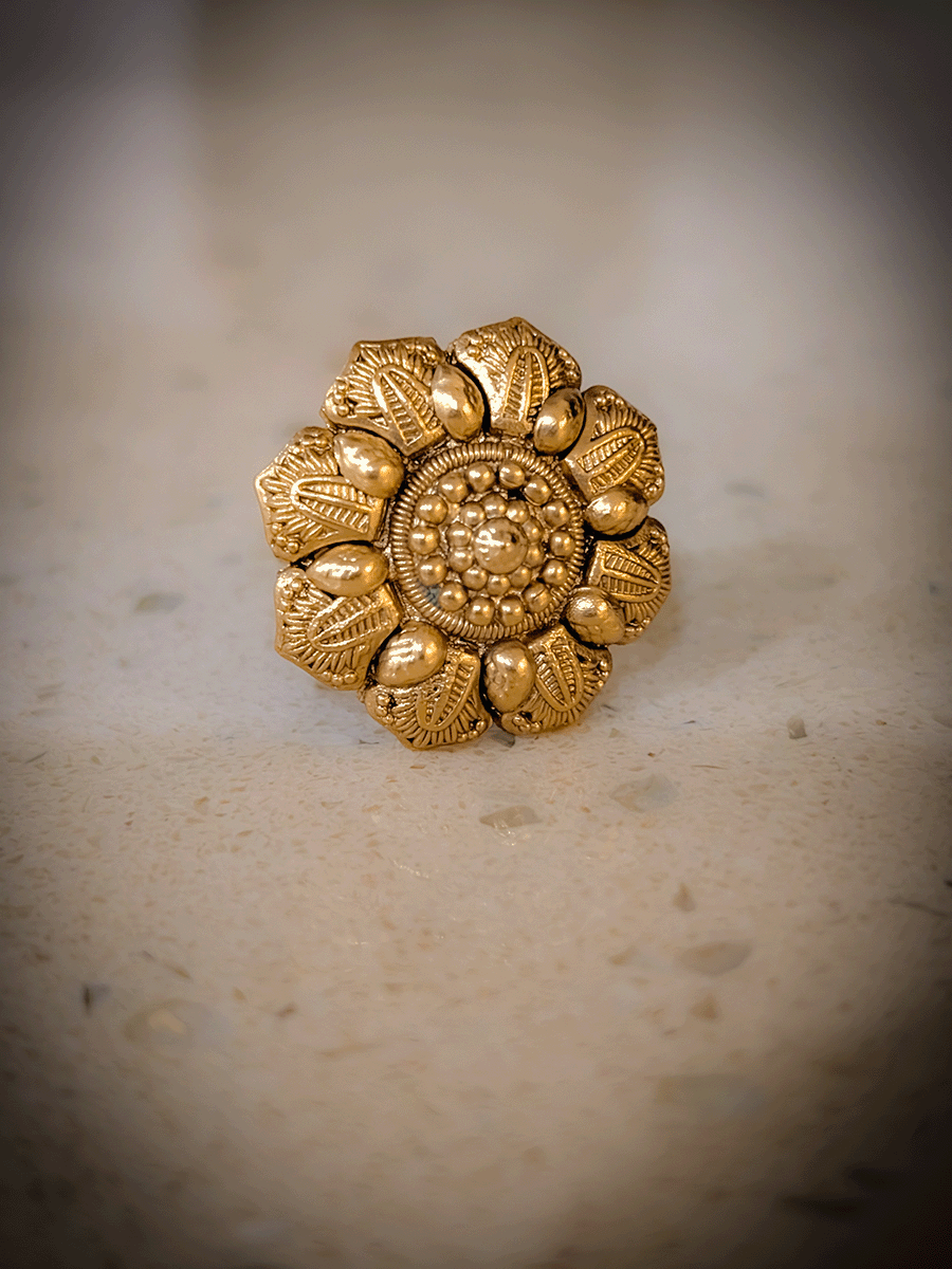 Gold finish self design flower adjustable ring