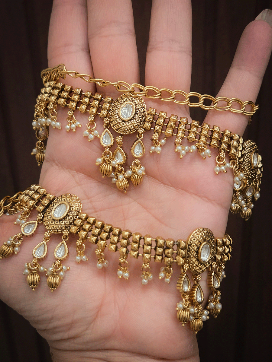 Kundan center oval tukdi with kundan hangings broad chain waist belt