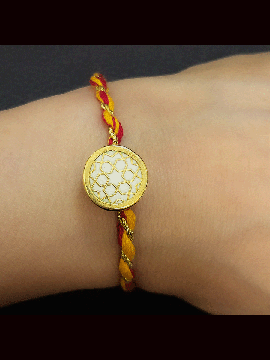 White round(1.5cm) thewa rakhi in mauli thread