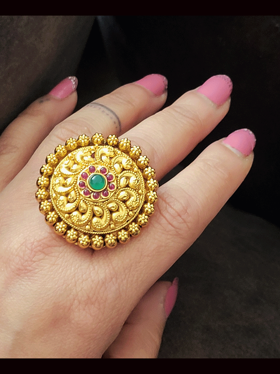 Round bold ruby and green flower in center paisley self design flower lace adjustable ring
