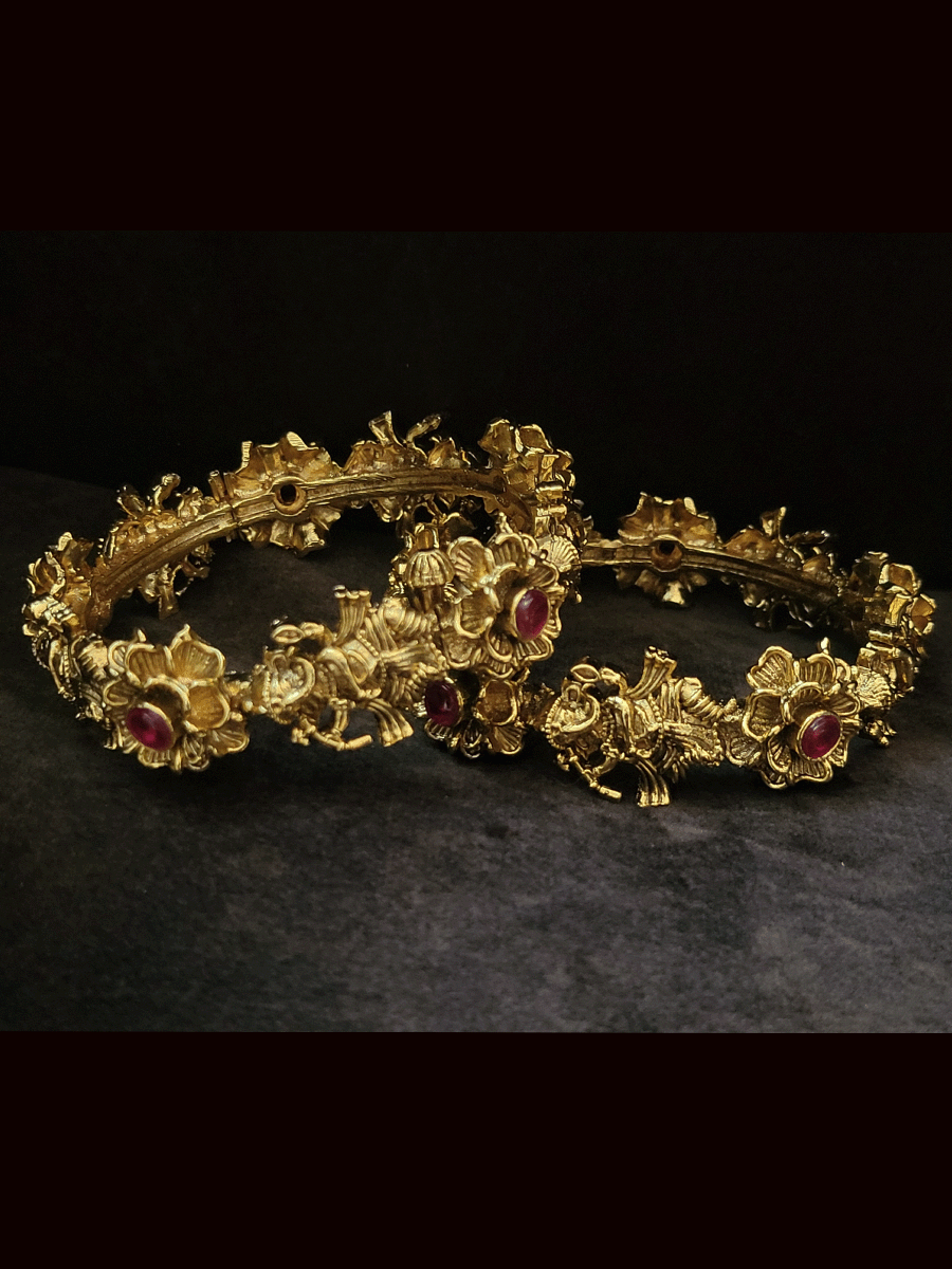 Set of two dancing ganpatiji openable kada's with ruby stone on flower design