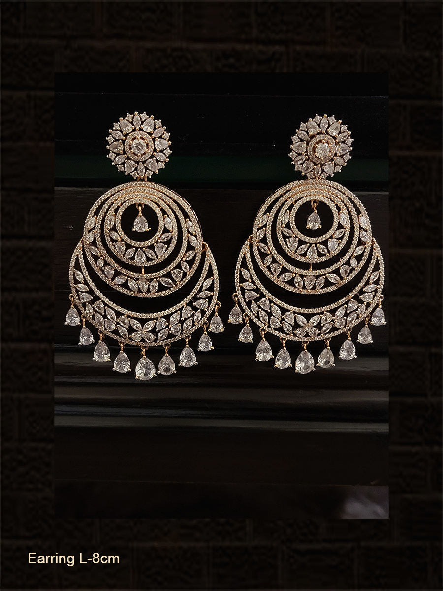 Flower top chandbali design long AD earrings with tear drop shaped white stones