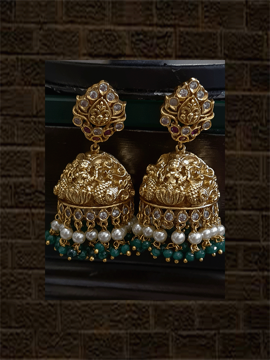 Intricate design polki ,ruby and green stones studded laxmiji set with pearl and green bead drops - Odara Jewellery