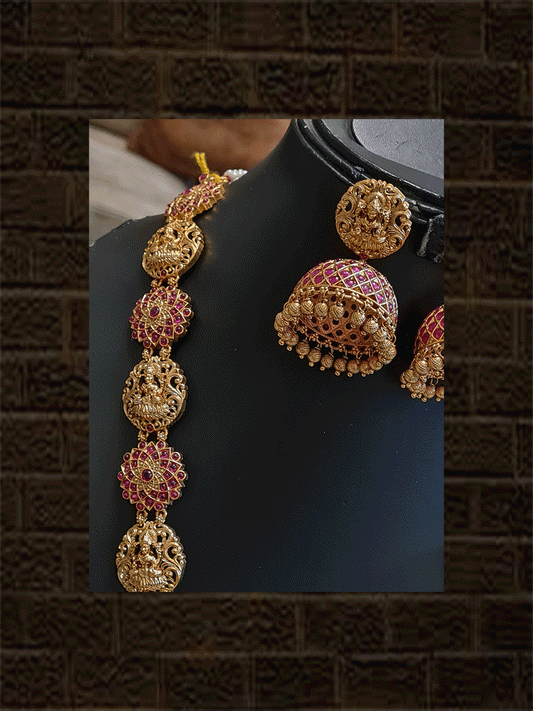 Round ruby stone studded laxmiji motif pendant long set with flower and laxmiji design side chain - Odara Jewellery