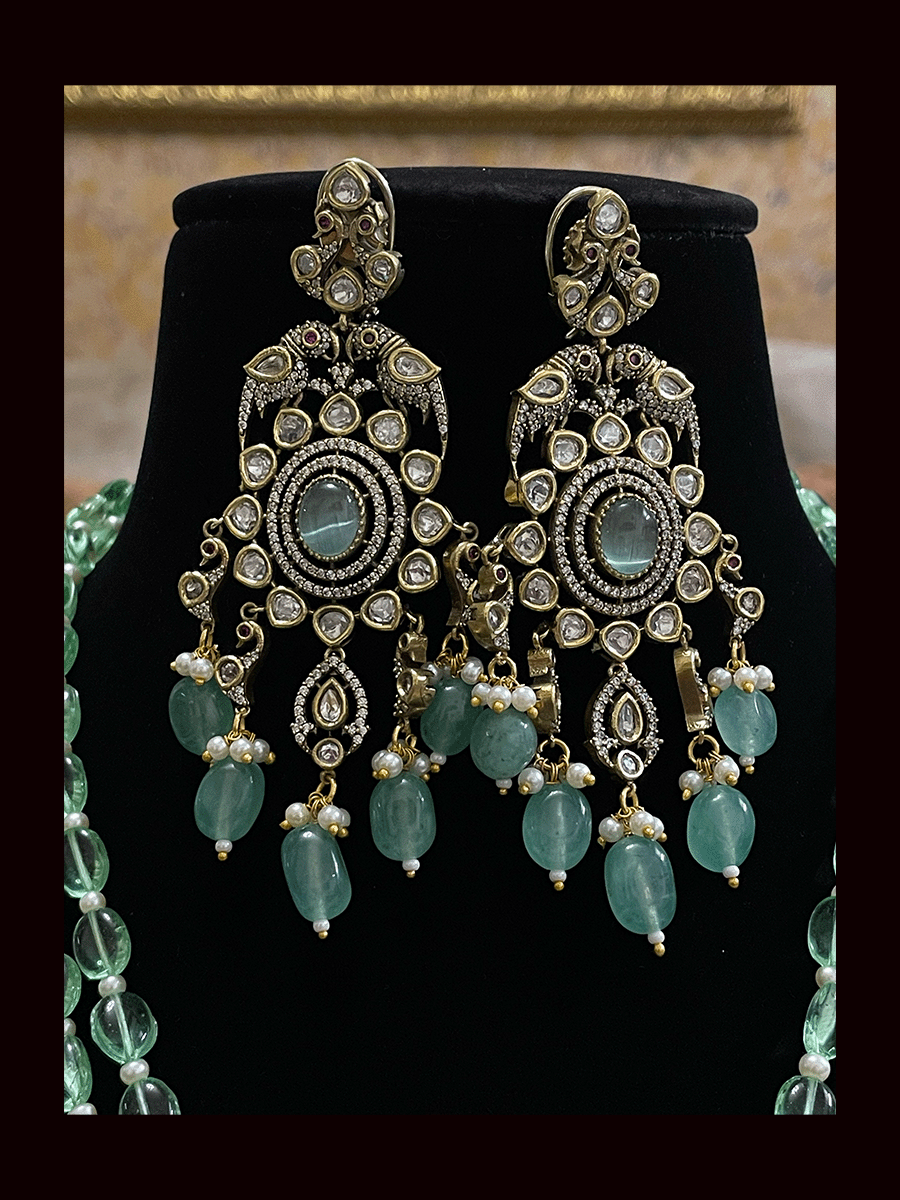 Three beaded 9 inch long strings zircons and kundan studded pendant set with parrot motifs on sides