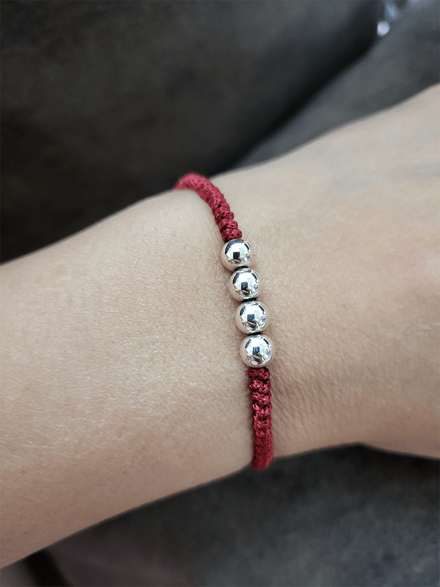 Sterling silver four silver beads rakhi in adjustable maroon thread - Odara Jewellery