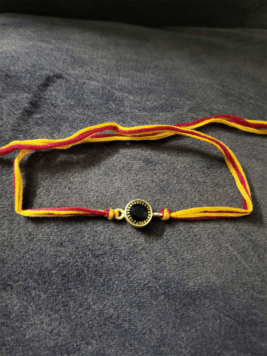 Coloured crystal stone bhai rakhi with mouli - Odara Jewellery