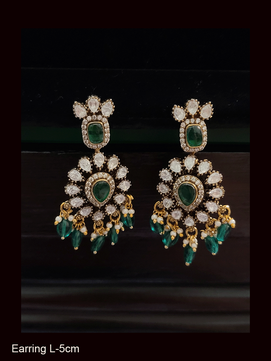 Leaf design kundan earrings with coloured drops