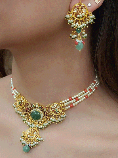 Aqua oval stone in the center with peacock side design aqua drops three pearl strings paachi kundan set