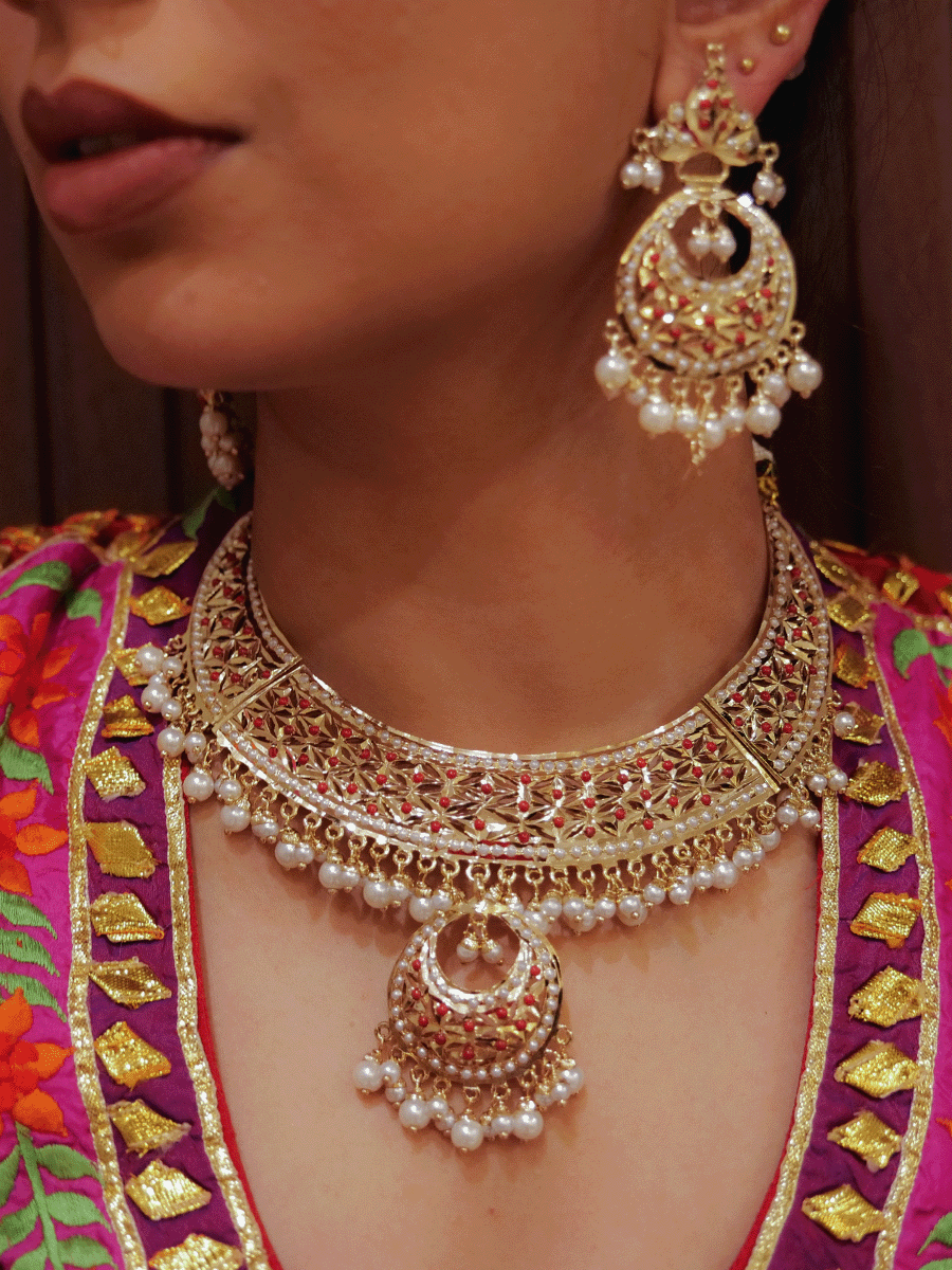 Jadau set with chandbali design center and pearl drops