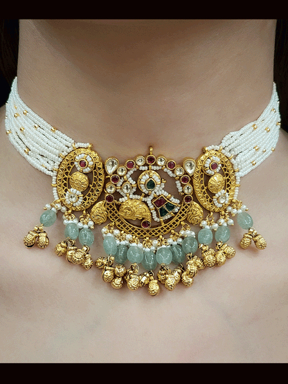 Paisley design paachi kundan center with oval side design aqua bead and ghunghru hangings set