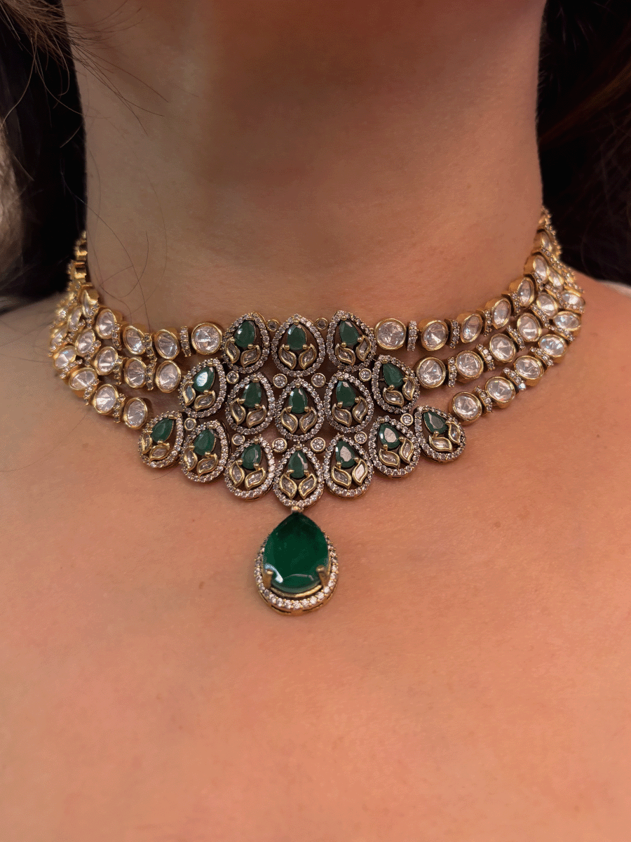 Green stones studded triple layer moissanite set with green tear drop hanging