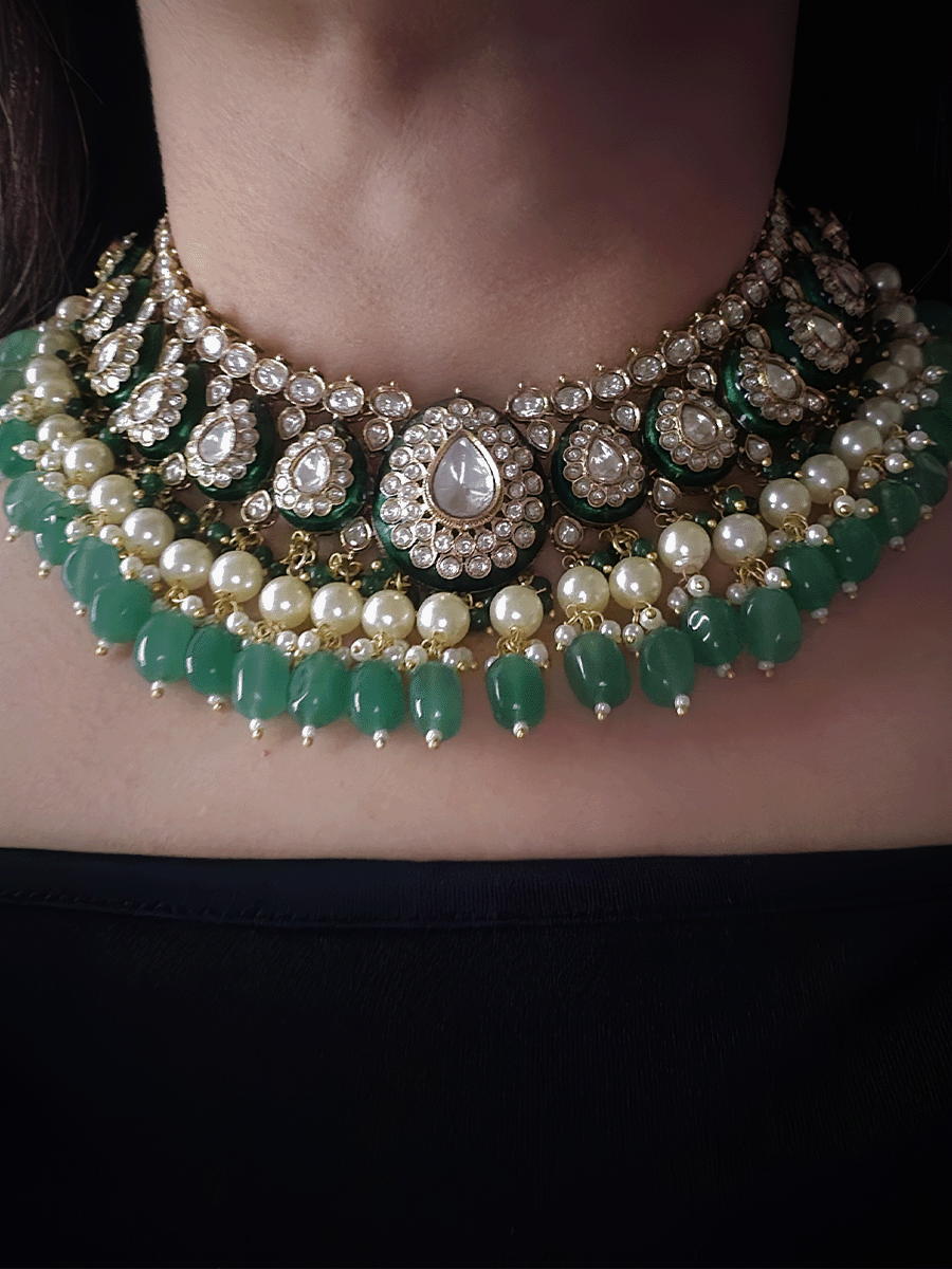 Green enamel tear drop shaped tukdies kundan set with pearl and jade green drops
