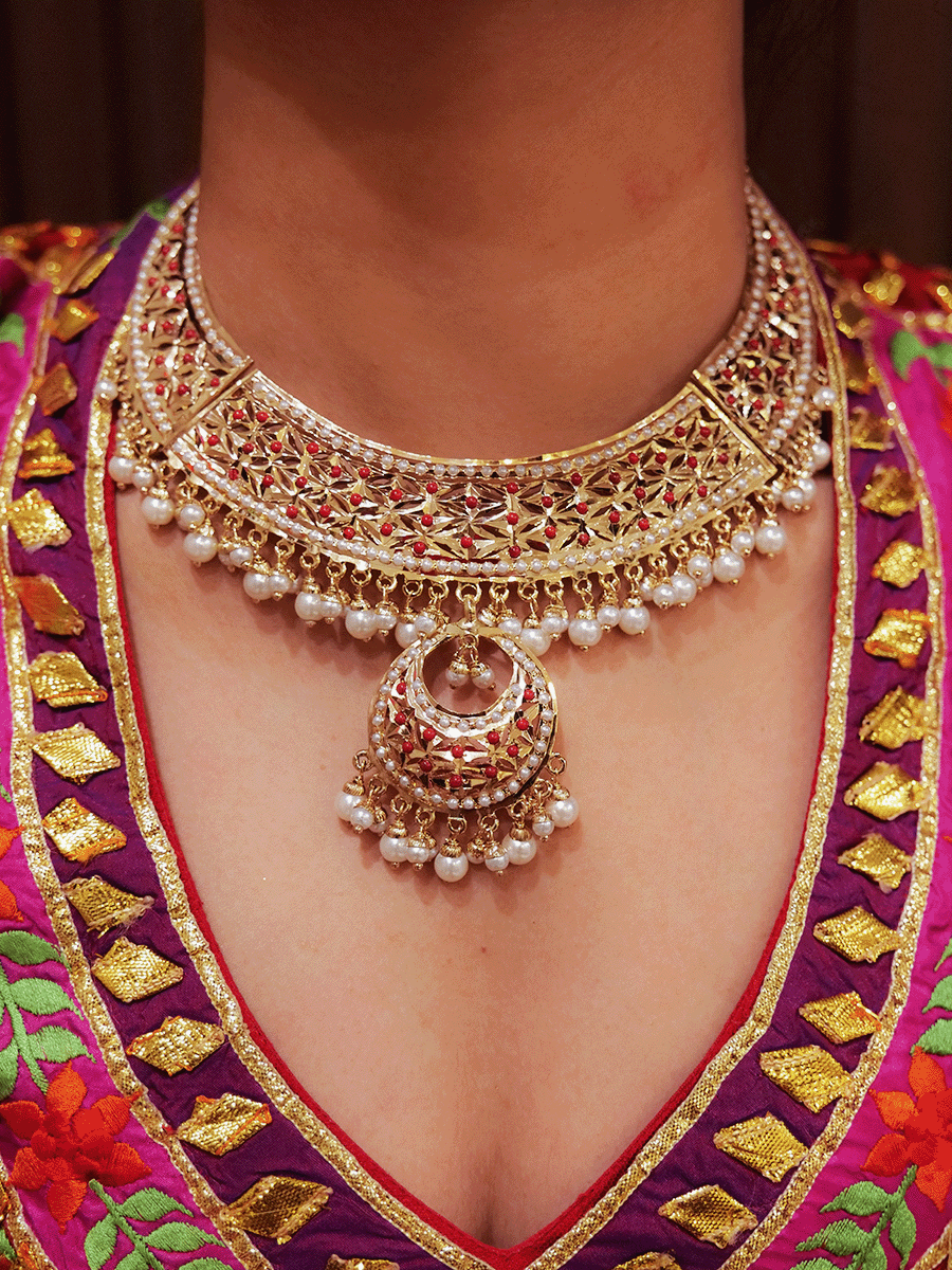 Jadau set with chandbali design center and pearl drops