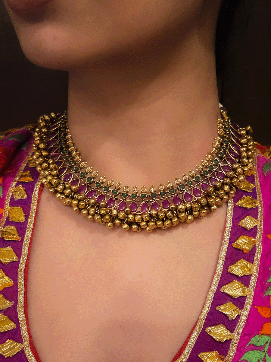 Ruby and green stones studded ghunghru cluster lace classy set in antique gold finish