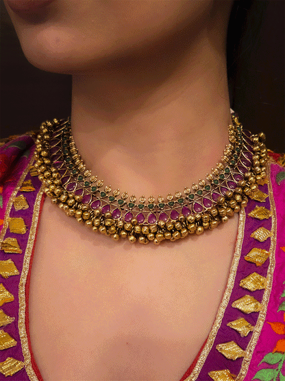 Ruby and green stones studded ghunghru cluster lace classy set in antique gold finish