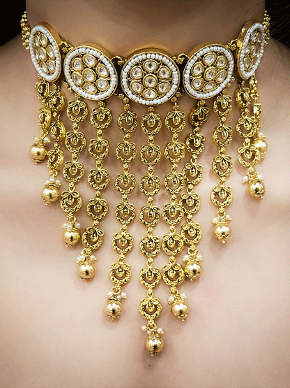 Round kundan tukdies with pirohi work long antique gold tassels set