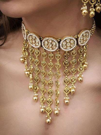 Round kundan tukdies with pirohi work long antique gold tassels set