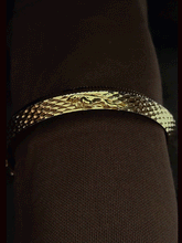 Load image into Gallery viewer, Lines on one side and Jaguar motif wavy design  on other side of rhodium and gold plated kada