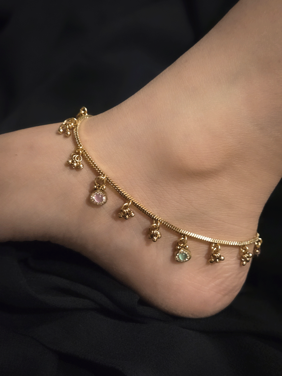 Ghunghru and Ruby and green leaf shaped hangings in chain anklets