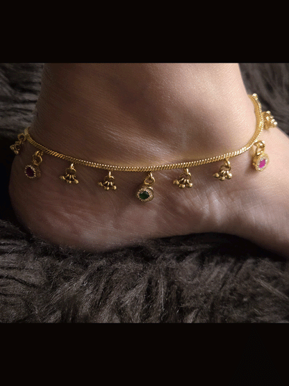 Ruby and green flower tukdies and ghunghru hangings in chain anklets